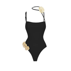 Black Elegance Floral Accent Swimsuit with Ruched Fringe Skirt