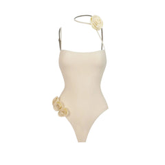 Black Elegance Floral Accent Swimsuit with Ruched Fringe Skirt